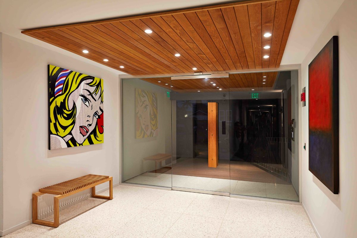 Entry experience with wood ceiling