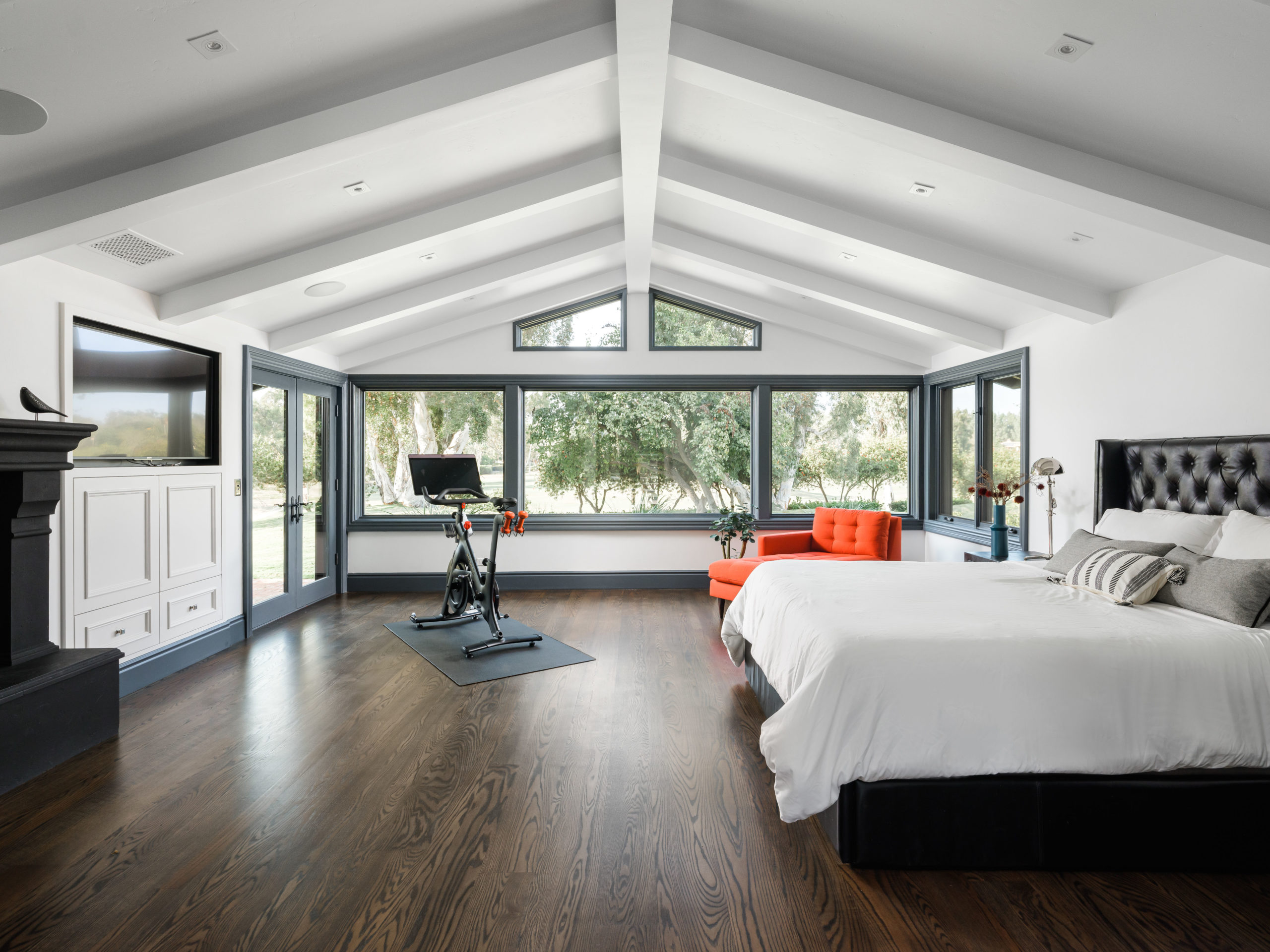 clean bedroom with vaulted ceiling