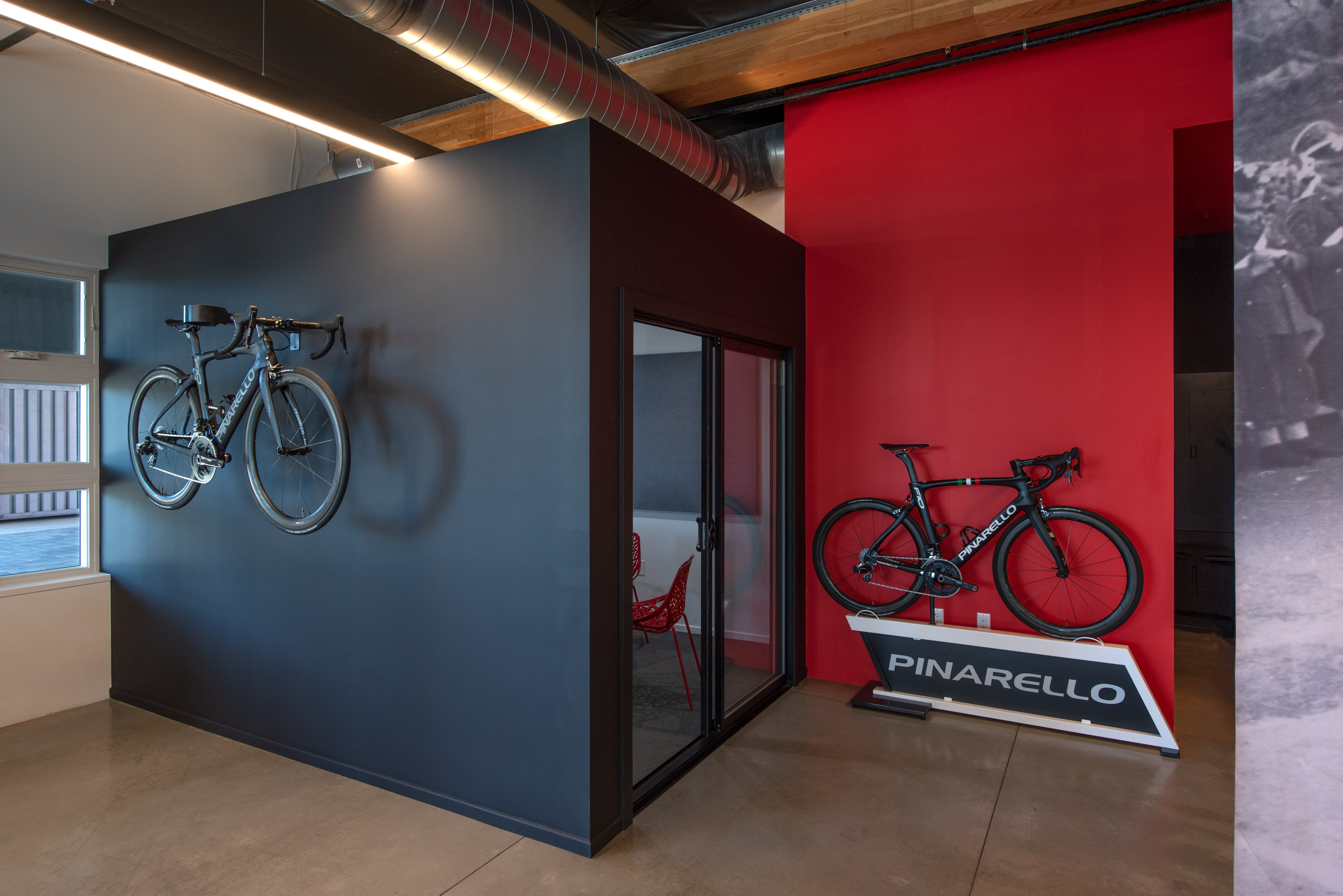 Pop of red accent wall with display bikes