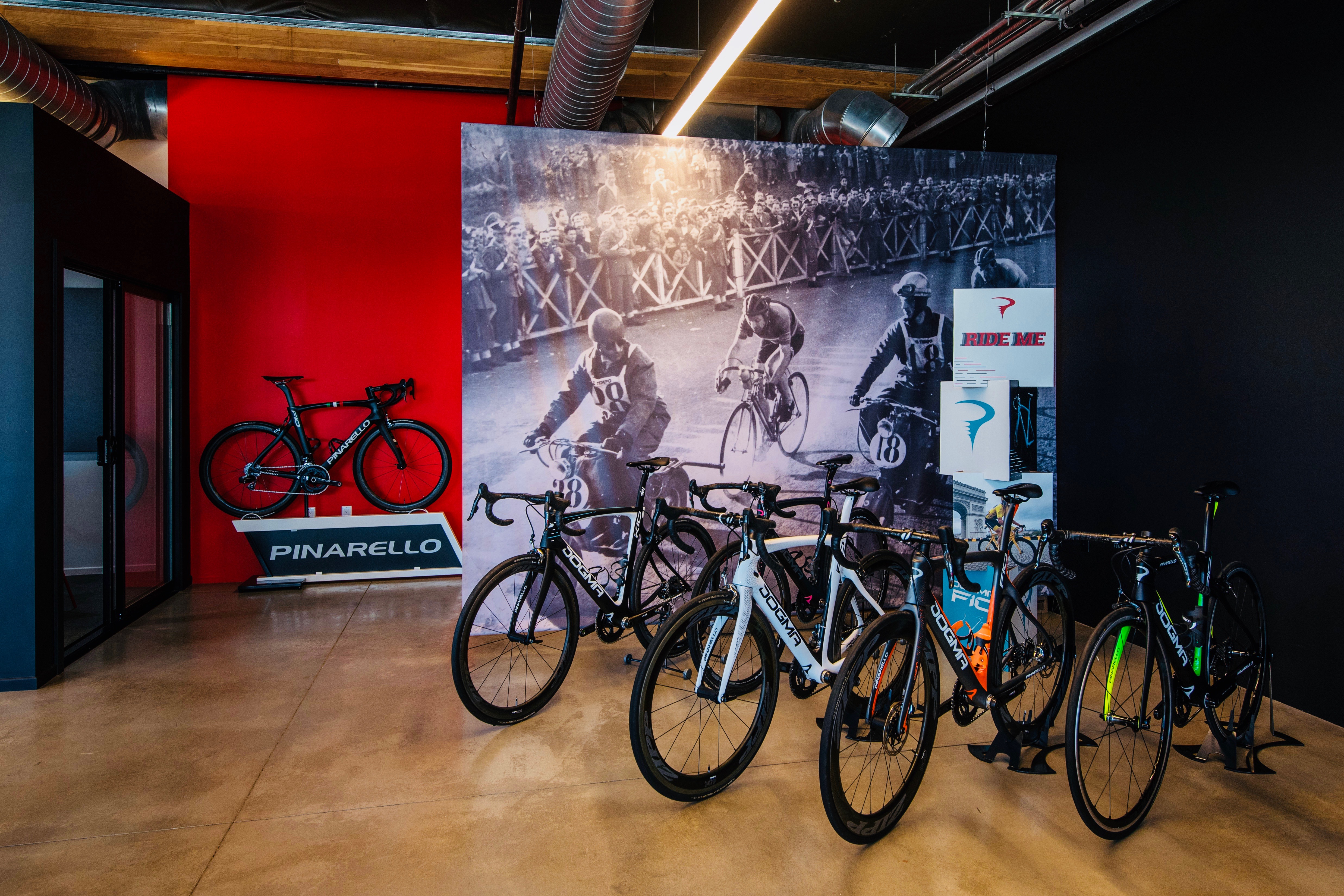 Bikes in front of red accent wall