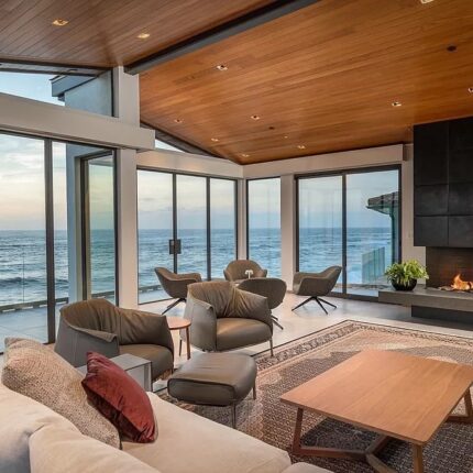 interior living room with fireplace and beach views
