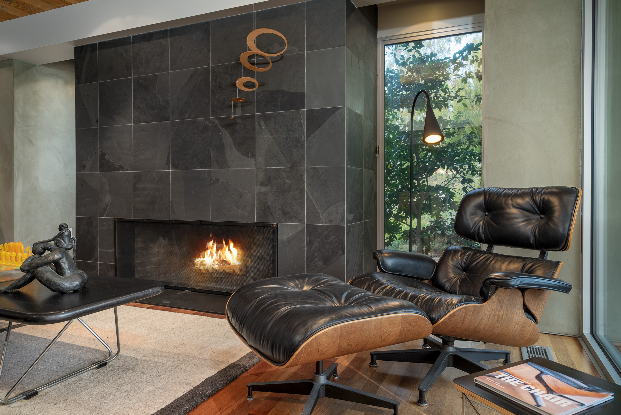 interior design seating area with fireplace and table